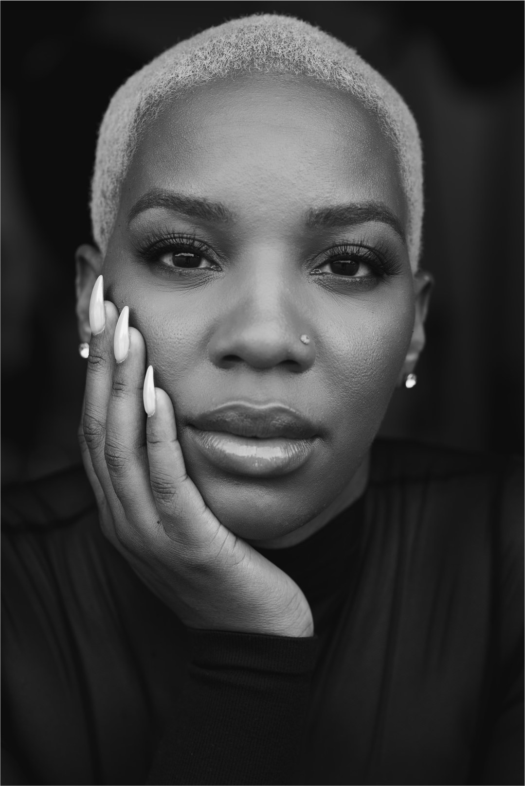 Black and white close-up of Courtney Nevins